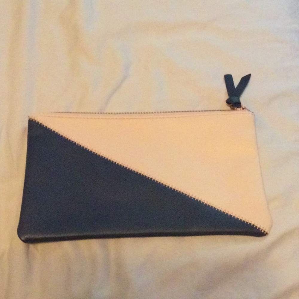 Baby pink and navy blue clutch